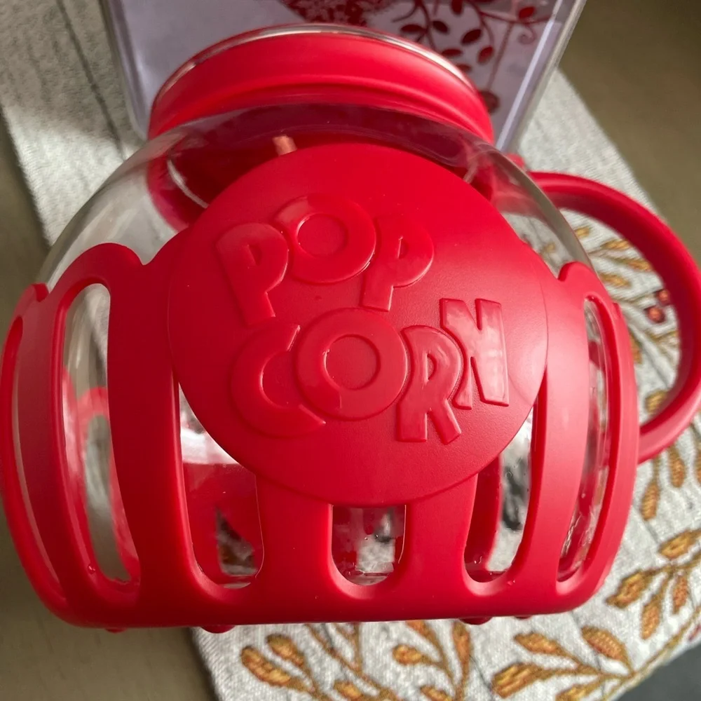 Glass microwave popcorn popper , gently used if used at all , holds a large bowl